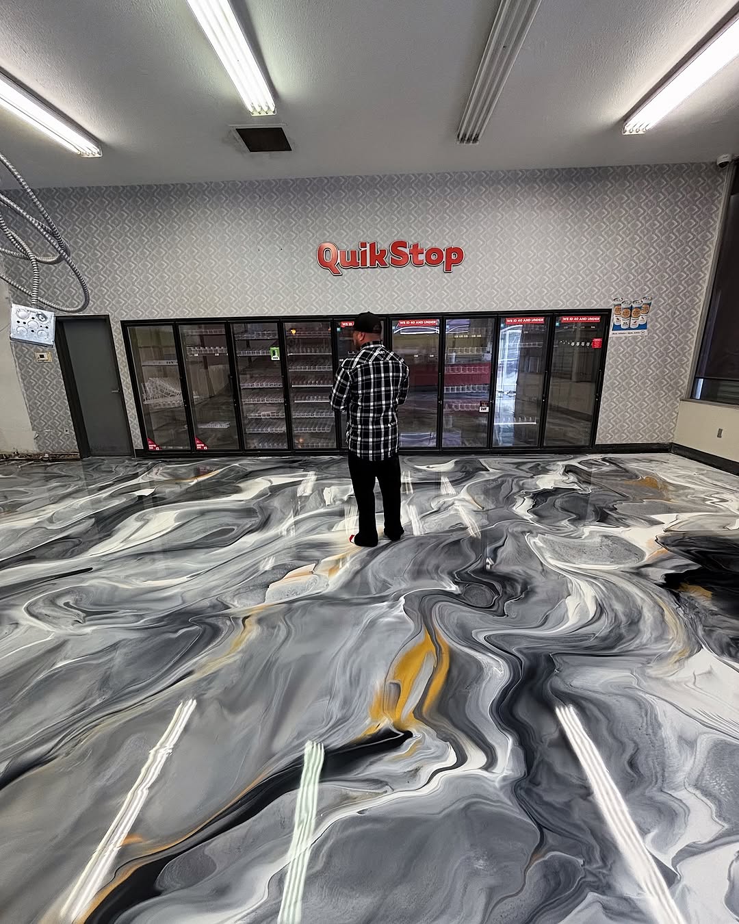 Commercial epoxy floor at QuikStop by Gold Coast Resin