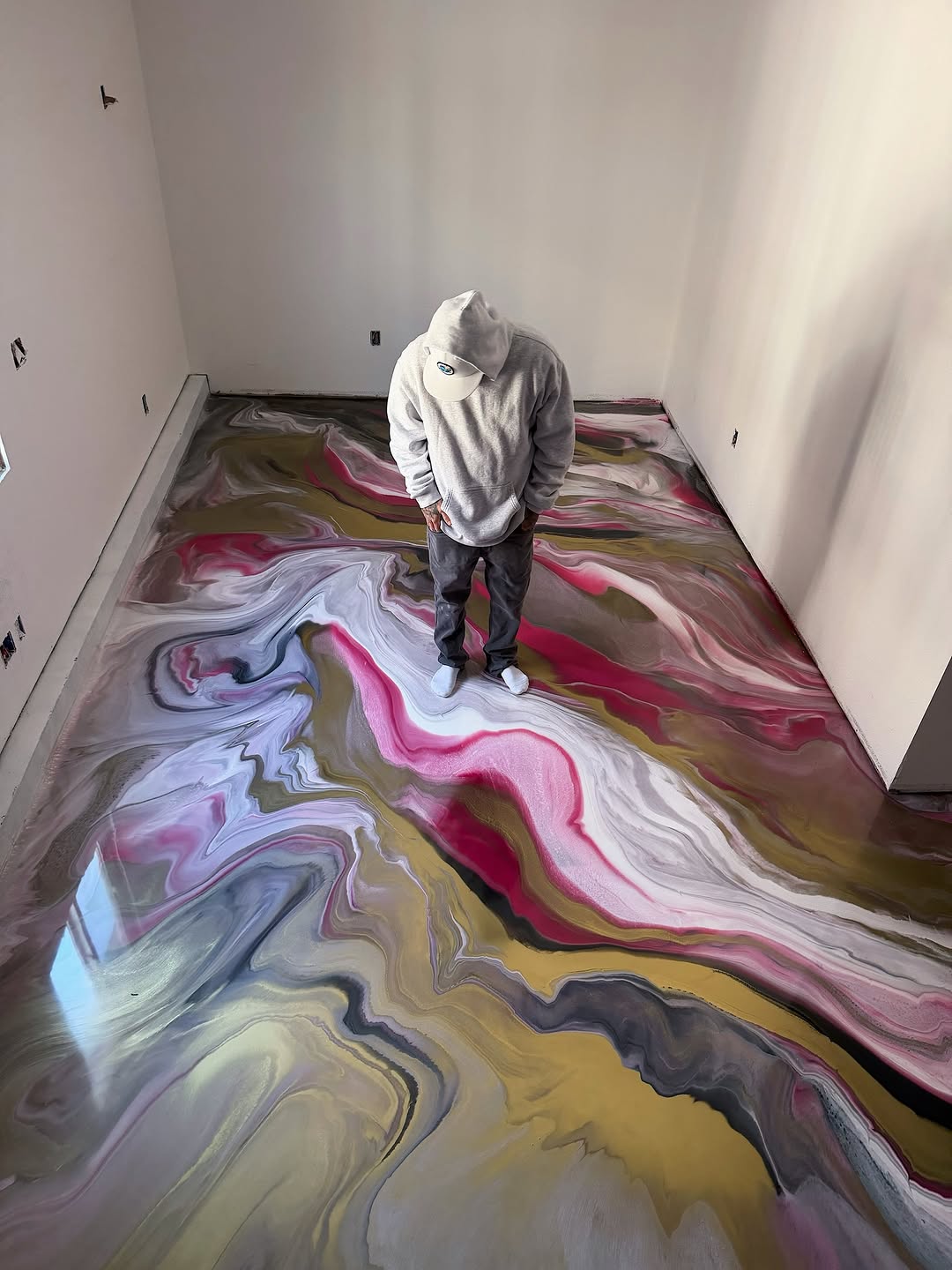 Close-up of resin countertop showing metallic swirl and depth layers